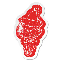 happy cartoon distressed sticker of a bald man wearing santa hat