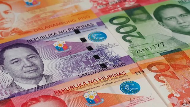 Philippine new peso bills rotating. Philippines currency money. Low angle. Stock video footage
