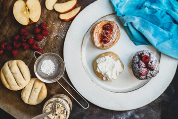 Polish cuisine - crispy, baked bread with yogurt, cinnamon, chilli, apples and raspberries