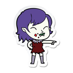 sticker of a cartoon vampire girl with blood on cheek