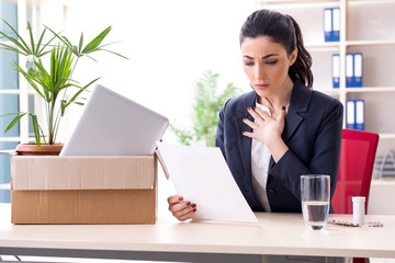 Young female employee being fired from her work