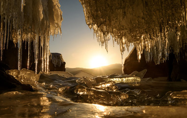 sunrise mountains ice cave icicles sun