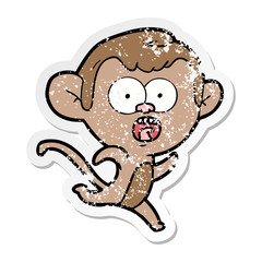 distressed sticker of a cartoon shocked monkey