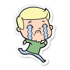 sticker of a cartoon man crying