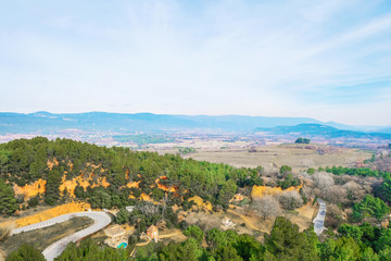 Editorial illustrative. Roussillon Provence France. February 9, 2019. Tourist village. The road to the canyon.Far horizon.