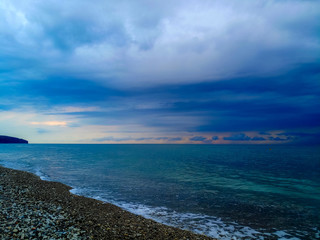 Amazing sea sunset, the sun, waves, clouds