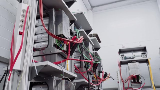 Test benches in the laboratory for the production of microprocessor-based protection and automation devices.