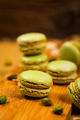 Green Pistachio Macaron Cookies Background. Selective focus.