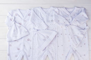 White pyjamas for baby boys.