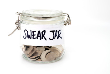 Swear jar with coins on white background