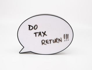 Do your tax return concept with text in speech bubble on white background