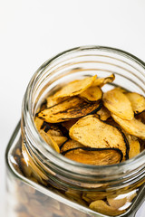 Roasted Garlic Slices on White Background. Selective focus.