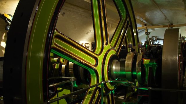 Giant spinning mechanical engine wheel.