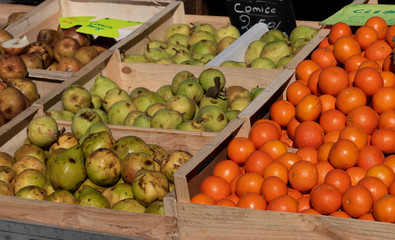 fruits in the wooden crates on the market