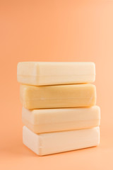 pieces of natural soap isolated on the orange background