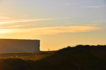 Cliffs of Kilkee in Ireland county Clare during sunset. Tourist destination