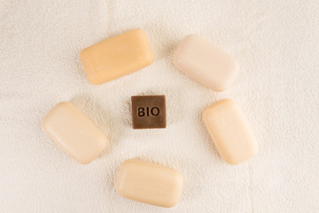 pieces of soap on a towel, top view