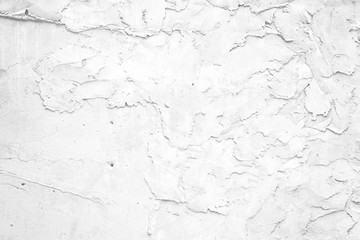 Grunge white painted rough textured wall