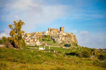 Fototapeta na wymiar View of rock castle, abbey and village of Motta Santa Anastasia, Sicily, Italy