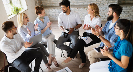 Happy creative team in office. Business, startup, design, people and teamwork concept