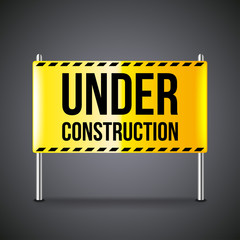 Under construction banner on dark vector background