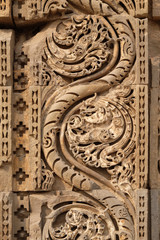 Stone carving on Qutab Minar, Delhi, India 