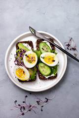 healthy breakfast. sandwich with vegetables and eggs