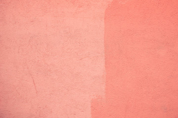 Coral color painted wall background