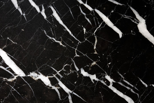 Black marble patterned texture background.
