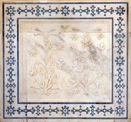Beautiful ornament on wall of palace in Amber Fort in Jaipur, Rajasthan, India
