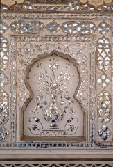 Detail of the mirrored ceiling in the Mirror Palace at Amber Fort in Jaipur, Rajasthan, India