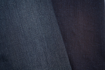 Dark blue texture of denim or blue jeans background.