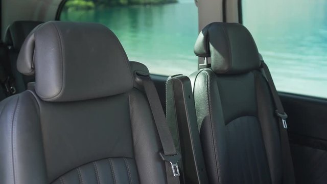 Leather seats interior of luxury minivan by Lake Wakatipu, Queenstown, New Zealand