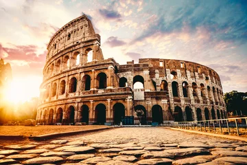 Foto op Aluminium Het oude Colosseum in Rome bij zonsondergang © kbarzycki