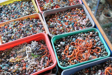 Multi colored beads and tools for making jewelry and crafts, Pushkar, India  - Powered by Adobe