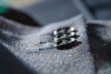 Detail of gentlemans suit showing cuff buttons