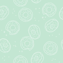 Soft, pastel mint green background with donuts. Vector seamless pattern with donuts. Cute sweet food baby background. Colorful design for textile, wallpaper, fabric, decor.