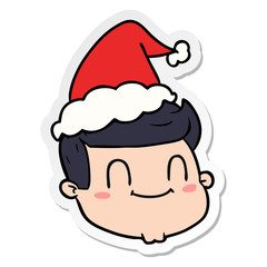 sticker cartoon of a male face wearing santa hat