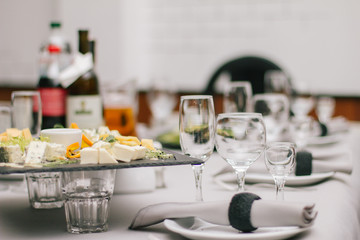 Empty glasses set in restaurant. Part of interior
