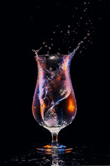 Water splash in a cocktail glass