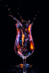 Water splash in a cocktail glass