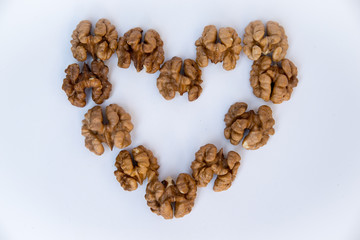 Walnuts kernels on white background.