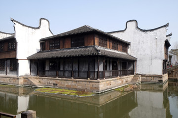Fototapeta na wymiar Traditional houses along the Grand Canal, ancient town of Yuehe in Jiaxing, Zhejiang Province, China