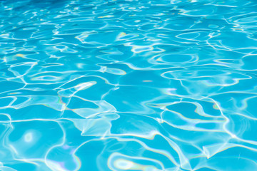 Beautiful ripple wave and blue water surface in swimming pool, Blue sea background and abstract