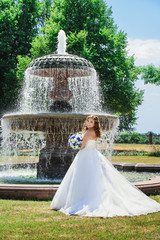 beautiful bride in front of the fontan