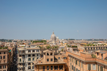 Obraz premium Panoramic view of city Rome with old houses from the Spanish steps