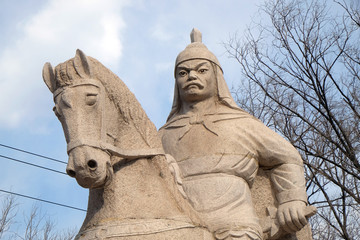 Fototapeta premium Stone statue of Ming Dynasty general Qi Jiguang, Shuiguan Great Wall, Badaling, Yanqing, China