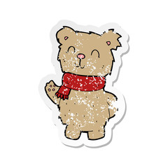 retro distressed sticker of a cartoon waving teddy bear