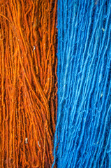multicolored woolen threads photographed by close-up.