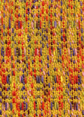 Fototapeta na wymiar Handwoven woolen fabric with yellow basis